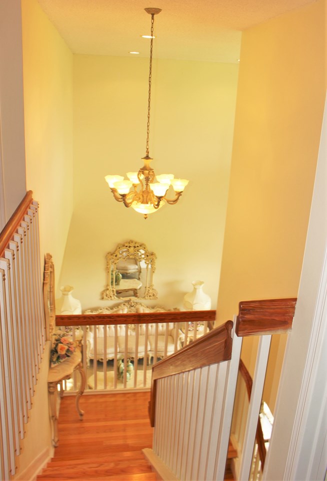 hardwood stairs and custom railing.....